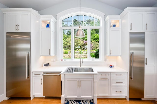 585 Santuit Rd, Cotuit, MA 02635 - kitchen with stainless steel appliances, healthy amount of natural light, and light countertops