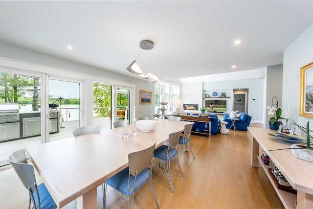 585 Santuit Rd, Cotuit, MA 02635 - dining area with light wood-style flooring and recessed lighting
