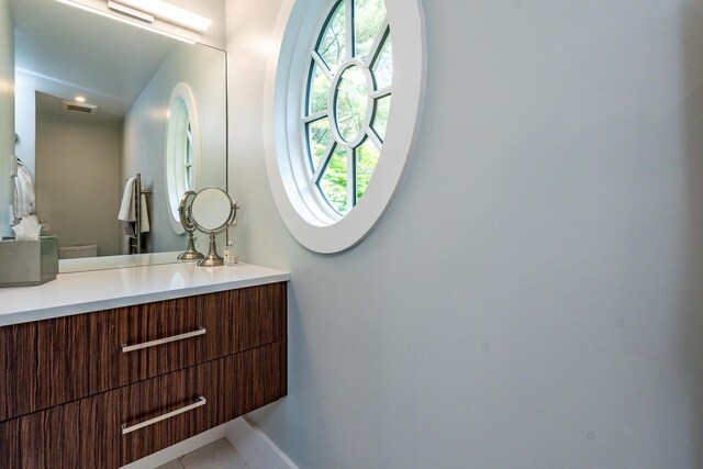 585 Santuit Rd, Cotuit, MA 02635 - bathroom featuring vanity and tile patterned flooring