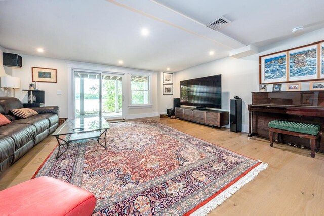 585 Santuit Rd, Cotuit, MA 02635 - living area featuring wood finished floors and recessed lighting