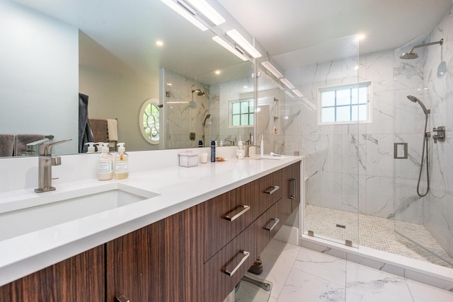 585 Santuit Rd, Cotuit, MA 02635 - full bath with a marble finish shower, double vanity, and marble finish flooring