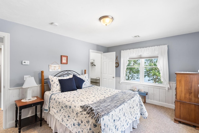 10 Stanley Rd, Mashpee, MA 02649 - carpeted bedroom with a wainscoted wall