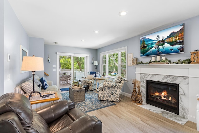 10 Stanley Rd, Mashpee, MA 02649 - living room featuring a fireplace, wood finished floors, and recessed lighting