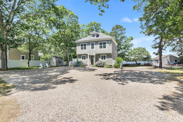 10 Stanley Rd, Mashpee, MA 02649 - view of front of home with a storage unit