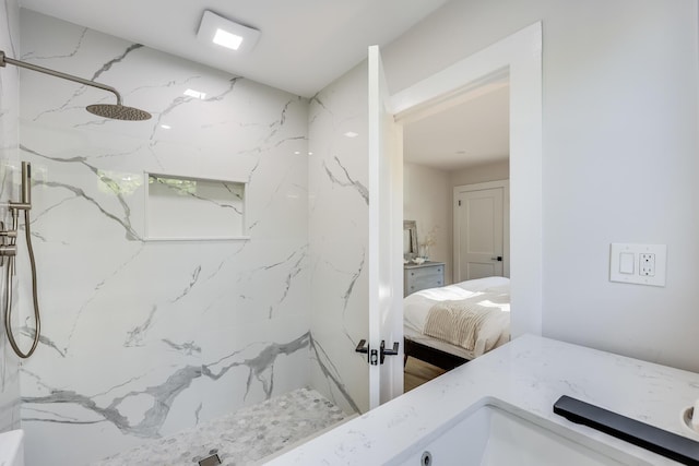 bathroom featuring tiled shower