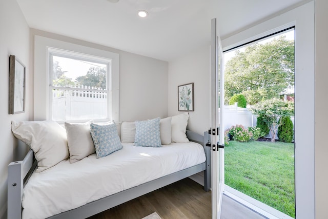 bedroom with wood-type flooring