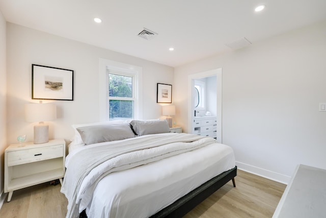 bedroom featuring light wood-type flooring