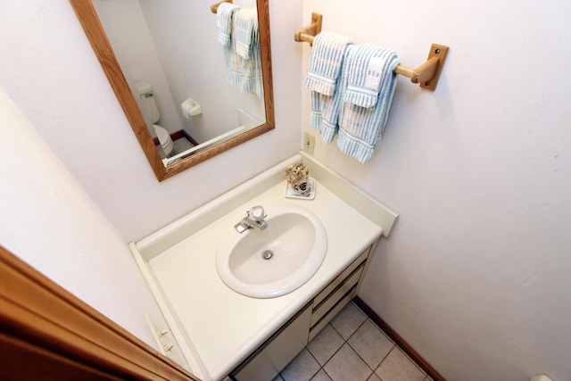 21 High Point Dr, Brewster, MA 02631 - half bath featuring toilet, vanity, tile patterned floors, and baseboard heating