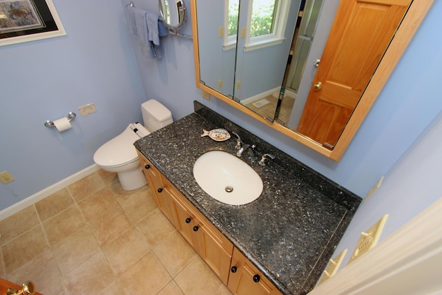 21 High Point Dr, Brewster, MA 02631 - bathroom with baseboards, vanity, toilet, and a shower