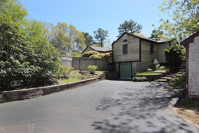21 High Point Dr, Brewster, MA 02631 - view of front facade featuring stairway and driveway
