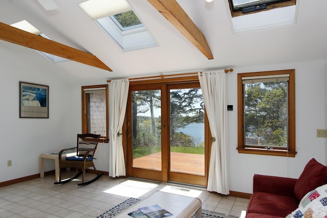 21 High Point Dr, Brewster, MA 02631 - doorway with a skylight, light tile patterned floors, and baseboards
