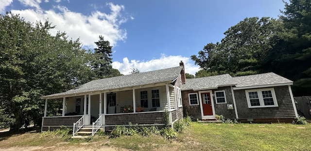 159 Pleasant Lake Ave, Harwich, MA 02645 - view of front of property featuring a chimney, covered porch, a front yard, and roof with shingles