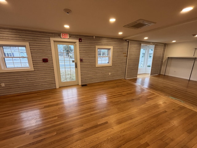 spare room featuring visible vents, wood finished floors, and recessed lighting