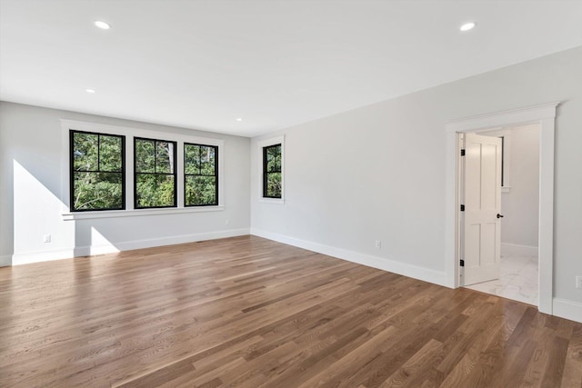 unfurnished room featuring light hardwood / wood-style flooring