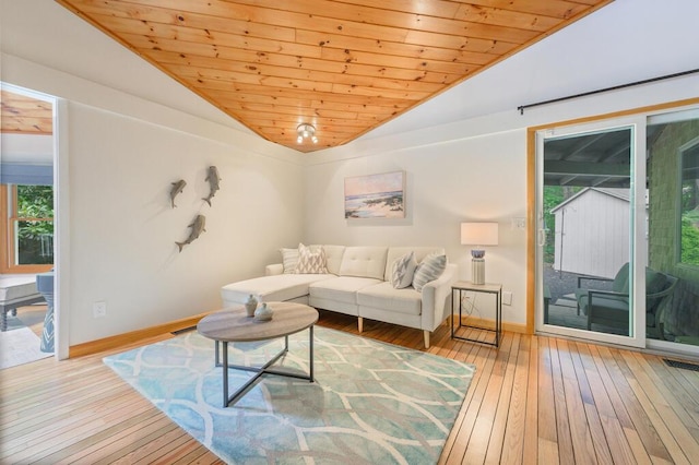 living room with light hardwood / wood-style flooring, wooden ceiling, and lofted ceiling