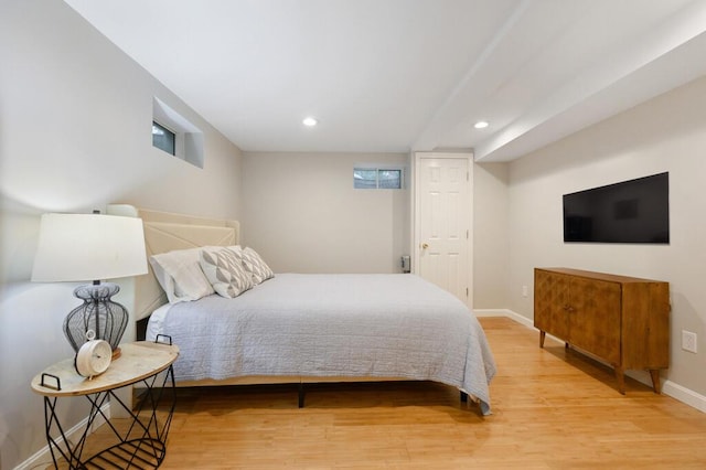 bedroom with light hardwood / wood-style flooring