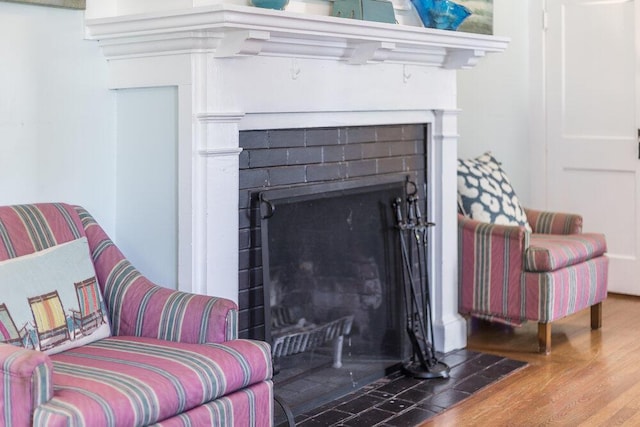 281 Gosnold St, Hyannis, MA 02601 - detailed view of a fireplace with flush hearth and wood finished floors