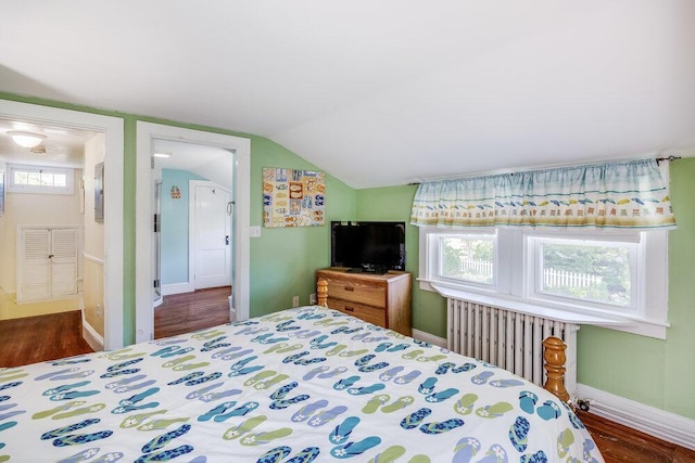 281 Gosnold St, Hyannis, MA 02601 - bedroom featuring wood finished floors, vaulted ceiling, and baseboards