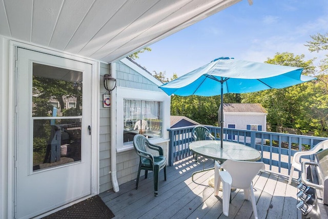 281 Gosnold St, Hyannis, MA 02601 - wooden deck with outdoor dining area