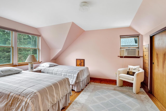 174 Middle Rd, Chilmark, MA 02535 - bedroom featuring vaulted ceiling, cooling unit, and light wood-style flooring