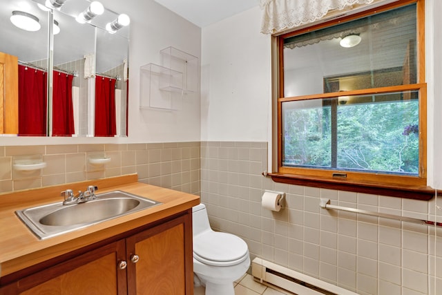 174 Middle Rd, Chilmark, MA 02535 - full bathroom featuring tile walls, vanity, a baseboard heating unit, tile patterned floors, and a shower with shower curtain