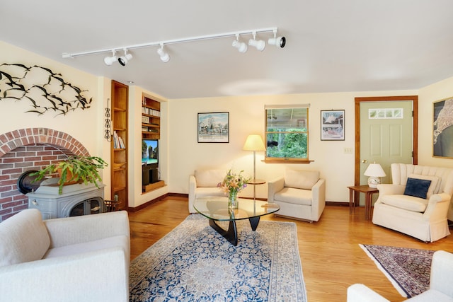 174 Middle Rd, Chilmark, MA 02535 - living area featuring track lighting, light wood-style flooring, and built in features