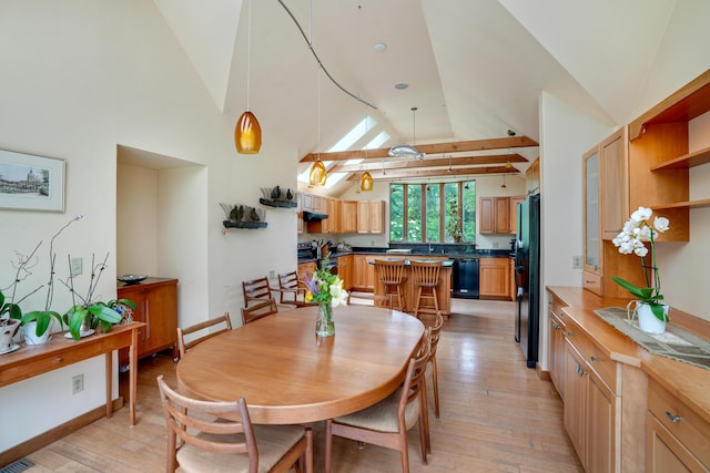 174 Middle Rd, Chilmark, MA 02535 - dining space with light wood-type flooring and high vaulted ceiling