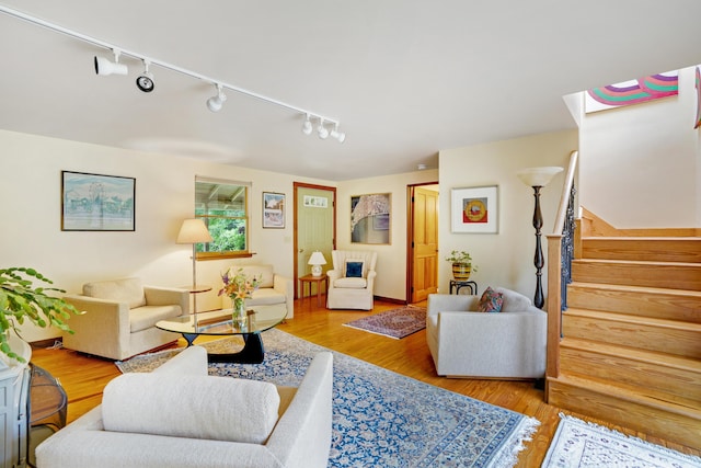 174 Middle Rd, Chilmark, MA 02535 - living room featuring track lighting, stairway, and wood finished floors