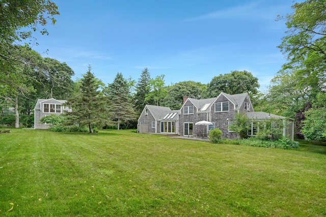 174 Middle Rd, Chilmark, MA 02535 - view of grassy yard featuring a patio and view of scattered trees