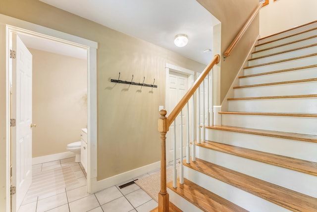 5 Bayes Hill Cir, Oak Bluffs, MA 02557 - stairs featuring tile patterned floors and baseboards