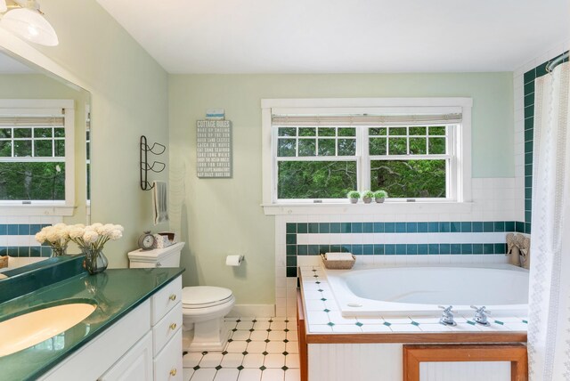 5 Bayes Hill Cir, Oak Bluffs, MA 02557 - bathroom featuring vanity, a bath, toilet, and baseboards
