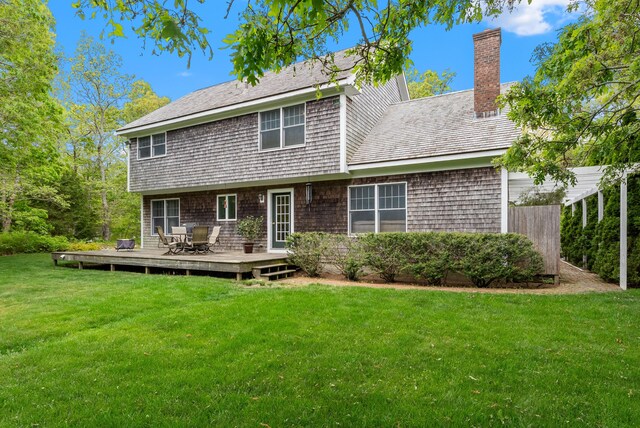 5 Bayes Hill Cir, Oak Bluffs, MA 02557 - rear view of property featuring a deck, a yard, and a chimney