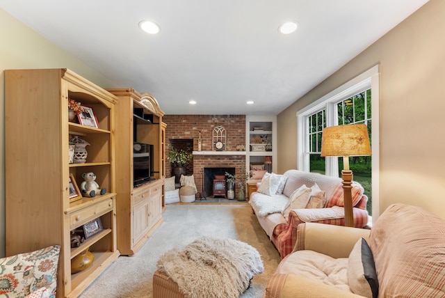 5 Bayes Hill Cir, Oak Bluffs, MA 02557 - living room featuring light carpet, recessed lighting, a brick fireplace, and built in shelves