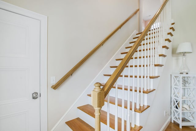 staircase with baseboards