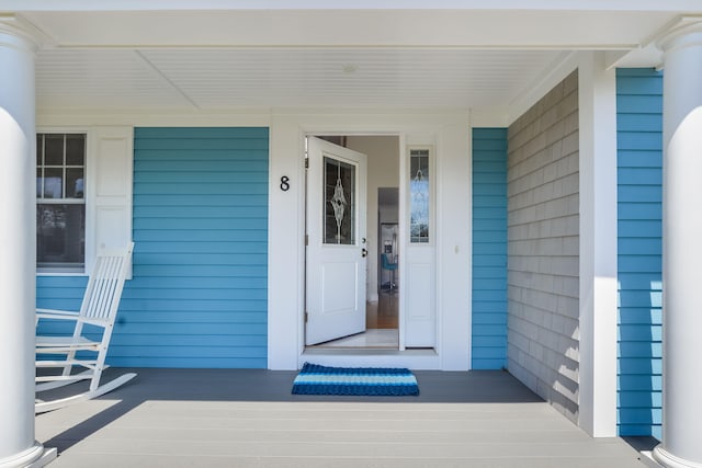 property entrance with a porch
