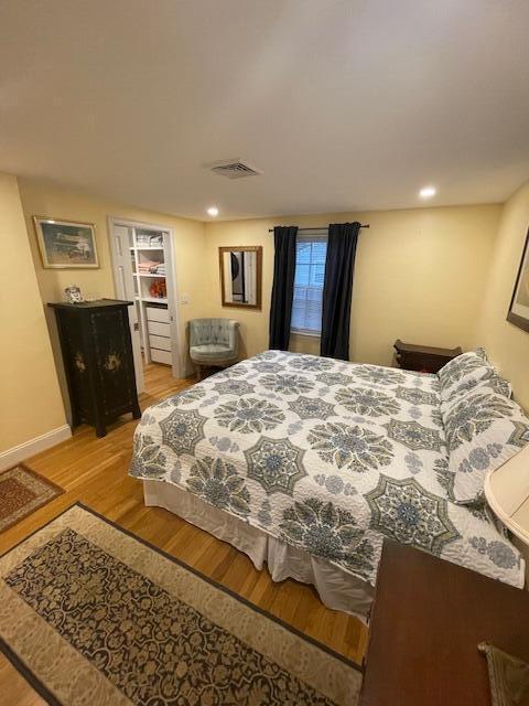 bedroom featuring light hardwood / wood-style flooring