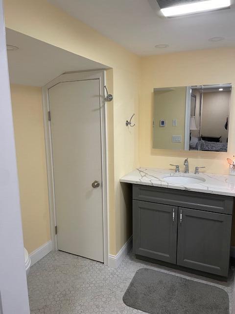 bathroom with vanity and toilet