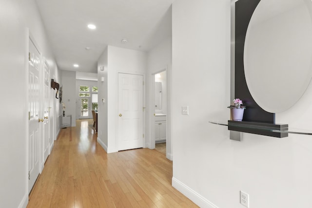 21 Grey Hawk Dr, Mashpee, MA 02649 - corridor featuring baseboards, light wood-type flooring, recessed lighting, and arched walkways
