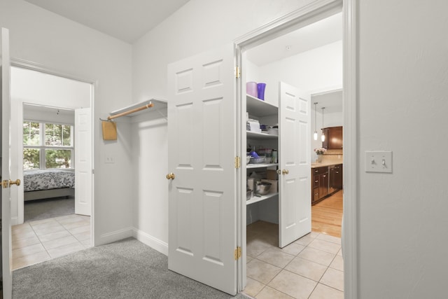 21 Grey Hawk Dr, Mashpee, MA 02649 - spacious closet featuring light tile patterned floors