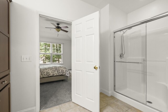 21 Grey Hawk Dr, Mashpee, MA 02649 - bathroom with tile patterned flooring, a stall shower, ceiling fan, ensuite bathroom, and baseboards