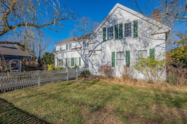 exterior space with a front lawn