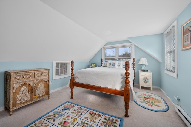 carpeted bedroom with baseboard heating and lofted ceiling