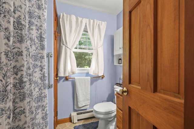 196 Commons Way, Brewster, MA 02631 - bathroom featuring baseboard heating and a shower with shower curtain