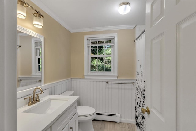 bathroom featuring ornamental molding, a baseboard radiator, toilet, and vanity