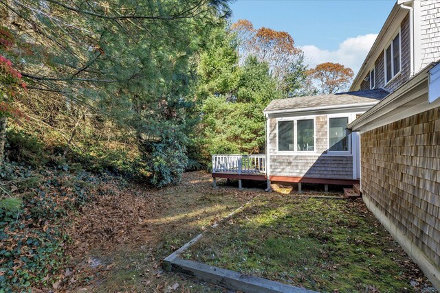 view of yard with a deck