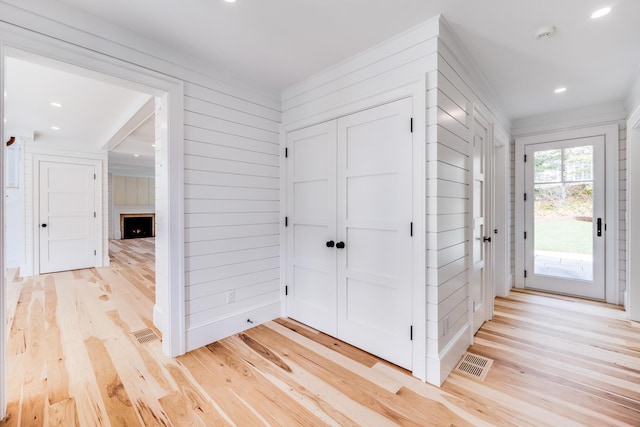 mudroom with light wood-type flooring