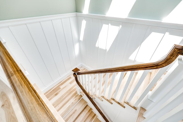 stairway with wood-type flooring