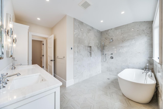 unfurnished bedroom with recessed lighting, light wood-style floors, baseboards, and a sink