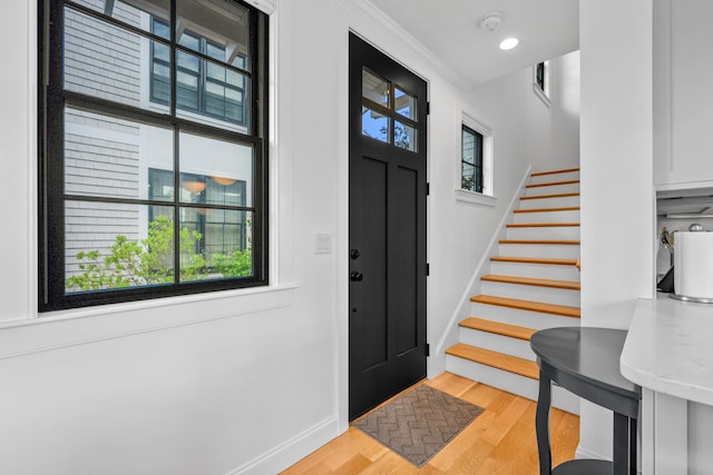 350 Bradford St Unit U5, Provincetown, MA 02657 - foyer entrance with light wood-style flooring, baseboards, stairs, and recessed lighting