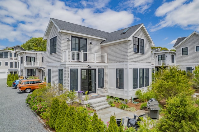 350 Bradford St Unit U5, Provincetown, MA 02657 - view of front of home with a balcony and roof with shingles